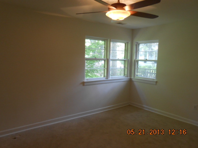 1512 Daly Road Wheaton, IL 60187 - Photo 13 of 20 an empty room with windows and fan