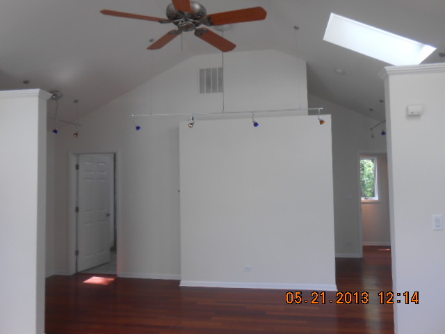 1512 Daly Road Wheaton, IL 60187 - Photo 19 of 20 a view of an empty room with wooden floor