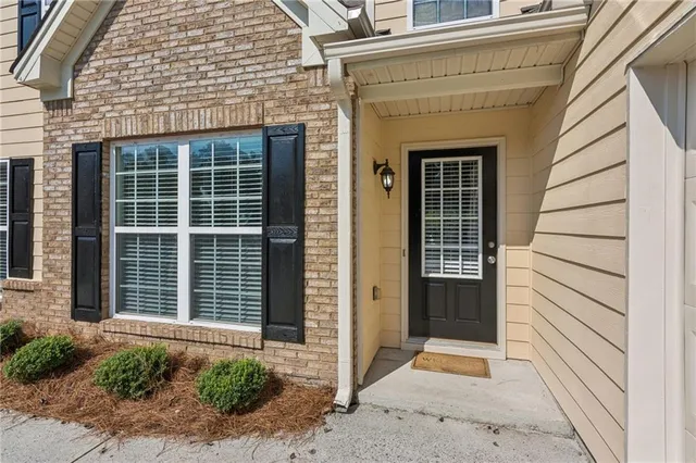 a view of entrance gate of a house