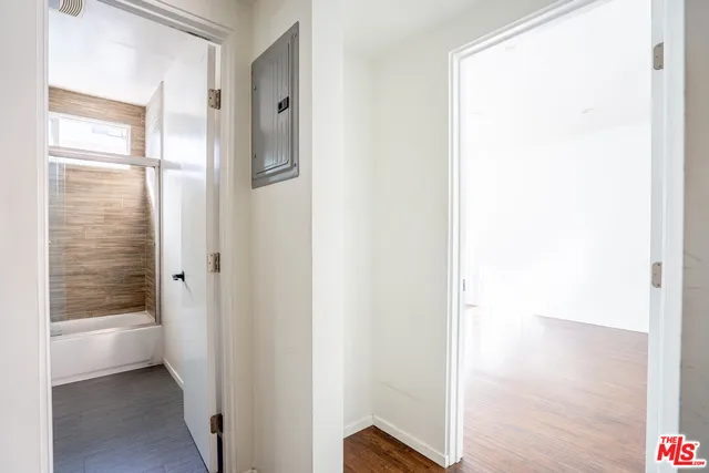 a view of a bathroom with a bathtub and a shower