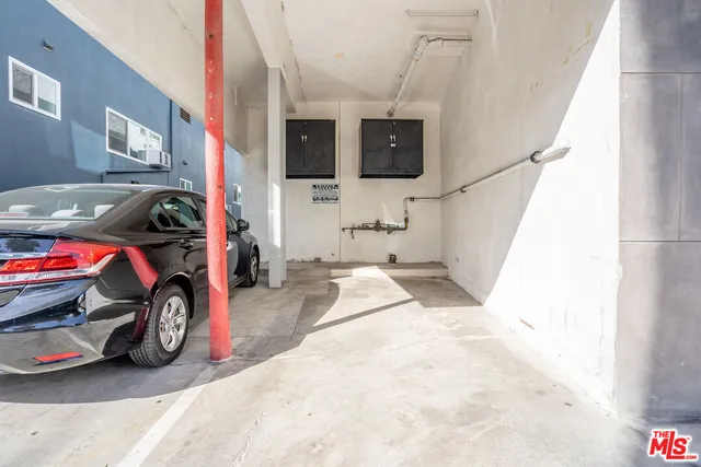 a car parked in front of a building