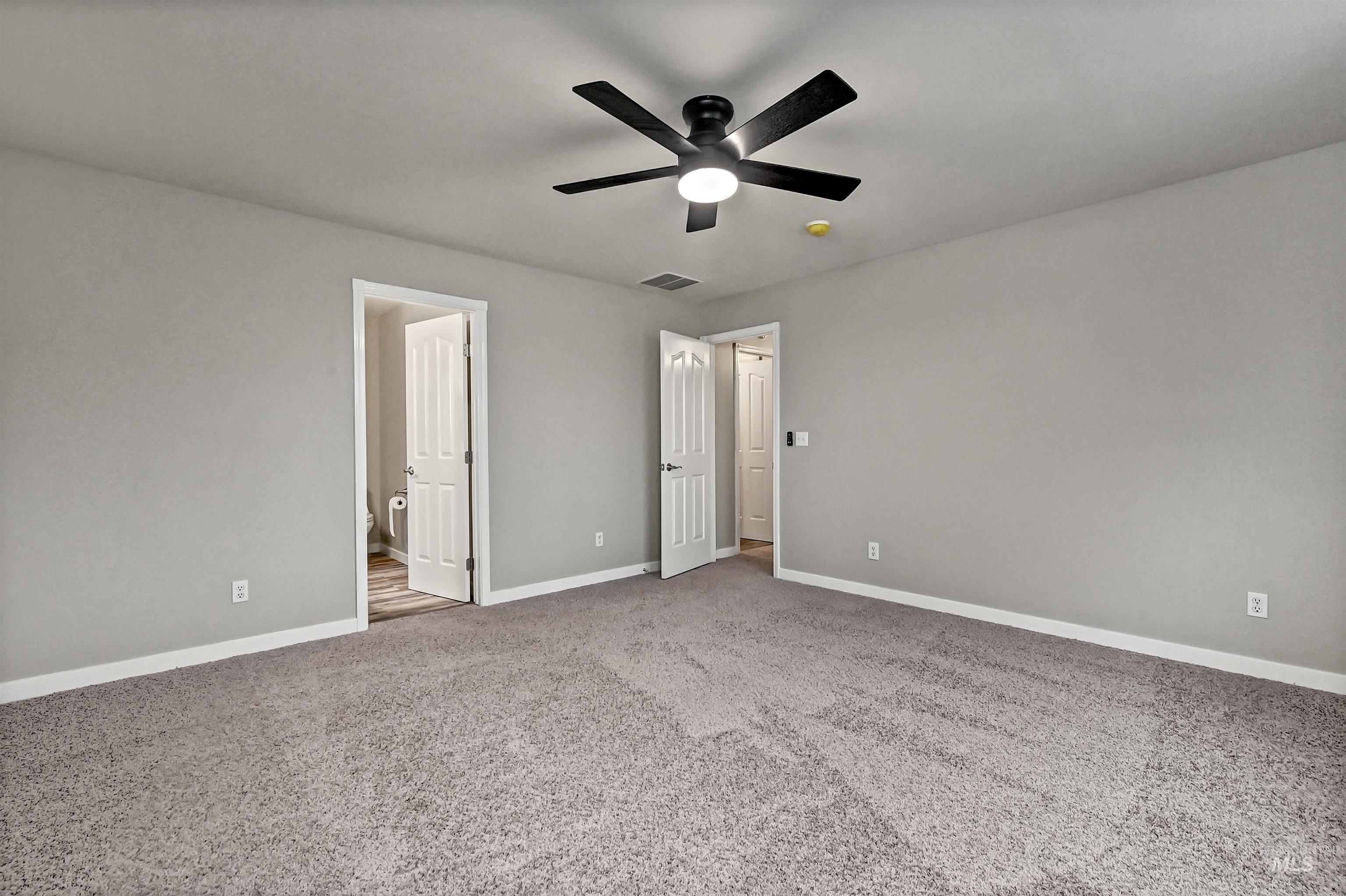 366 West Harris Street Meridian, ID 83642 - Photo 15 of 31 Unfurnished bedroom featuring light colored carpet and a ceiling fan
