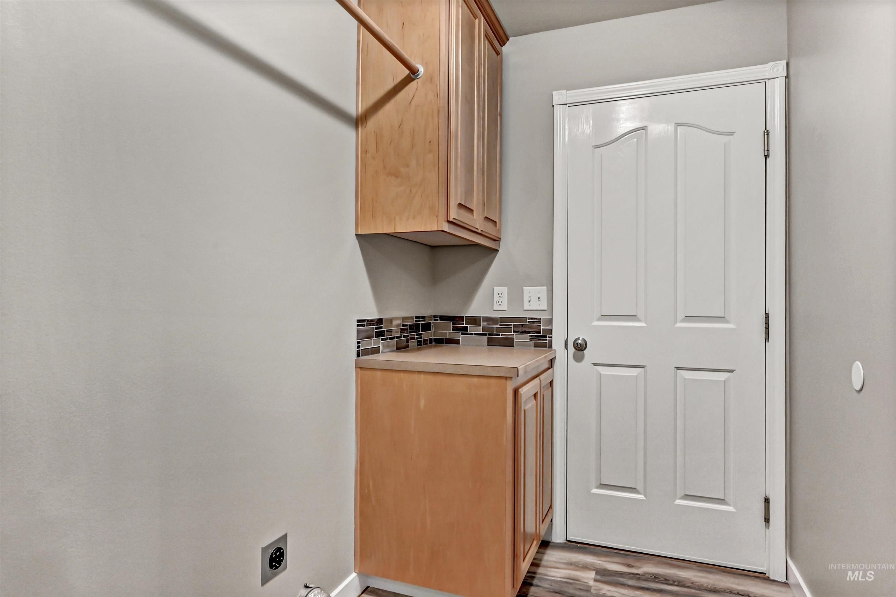 366 West Harris Street Meridian, ID 83642 - Photo 24 of 31 Washroom with hookup for an electric dryer and light wood-style floors