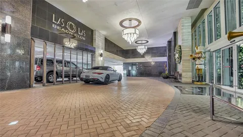 a view of balcony with furniture