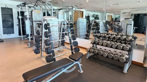 a view of a room with gym equipment
