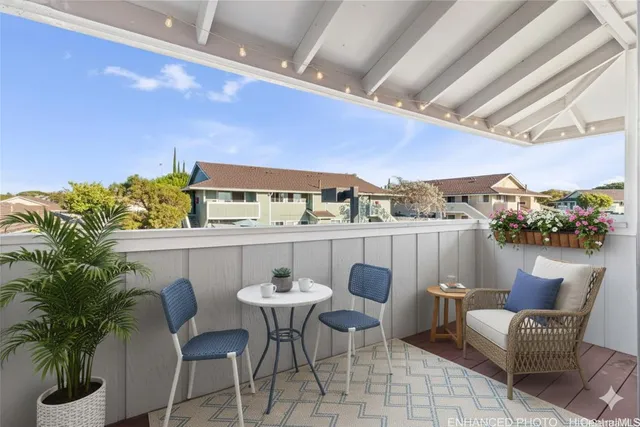 a outdoor dining space with furniture and outdoor view