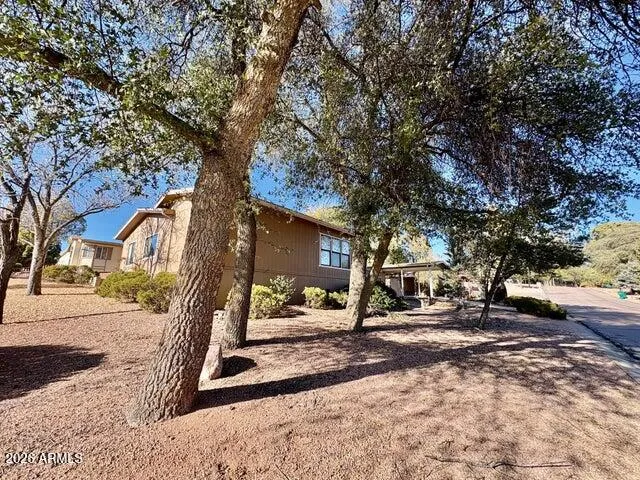 a building with trees in front of it