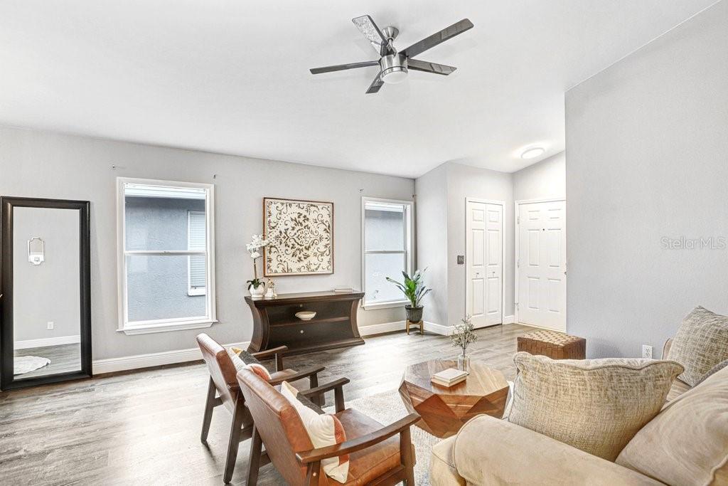 807 Cape Cod Circle Valrico, FL 33594 - Photo 7 of 26 a living room with furniture and a window