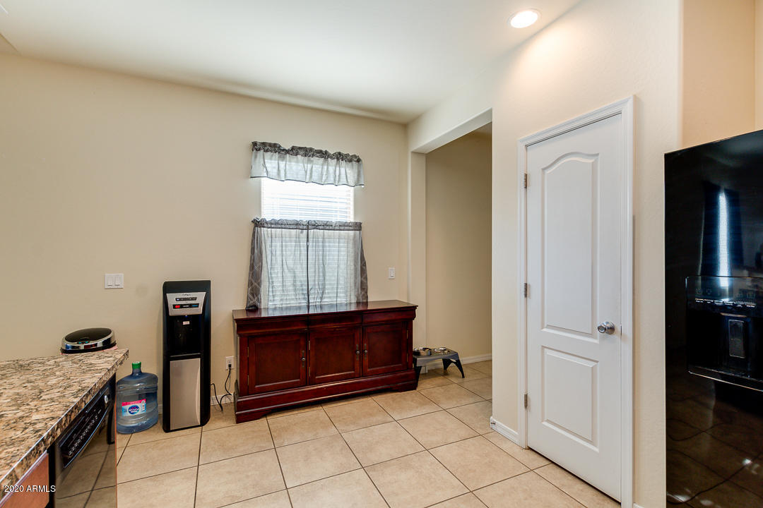 7615 West Carter Road Laveen, AZ 85339 - Photo 15 of 34 a view of kitchen with cabinets and window