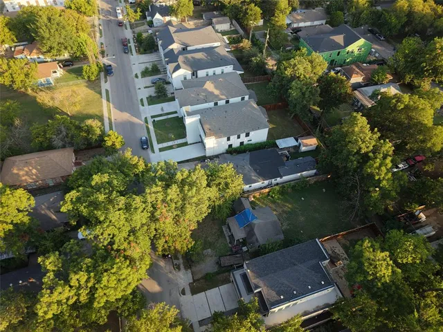 an aerial view of a house with a garden