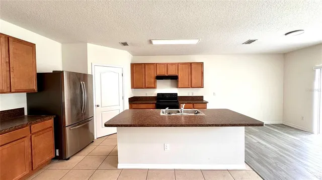 a sink sitting next to a window