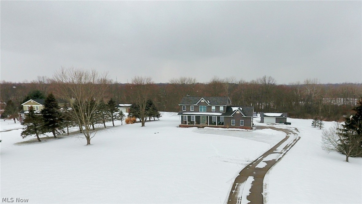 6087 Hanna Road Ravenna, OH 44266 - Photo 1 of 34 Check out this GORGEOUS setting! This house sits hundreds of feet off the road and has a concrete driveway to lead the way home!