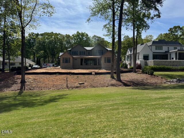 7117 North Ridge Drive Raleigh, NC 27615 - Photo 50 of 91 Exterior View From Golf Course
