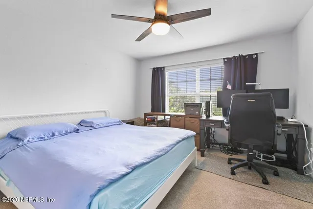 a bathroom with a sink vanity and a mirror