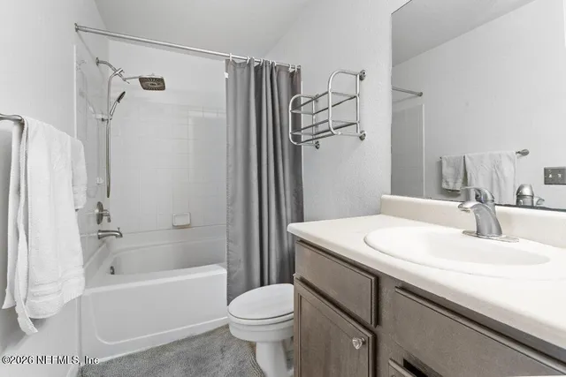 an aerial view of a houses with outdoor space and lake view