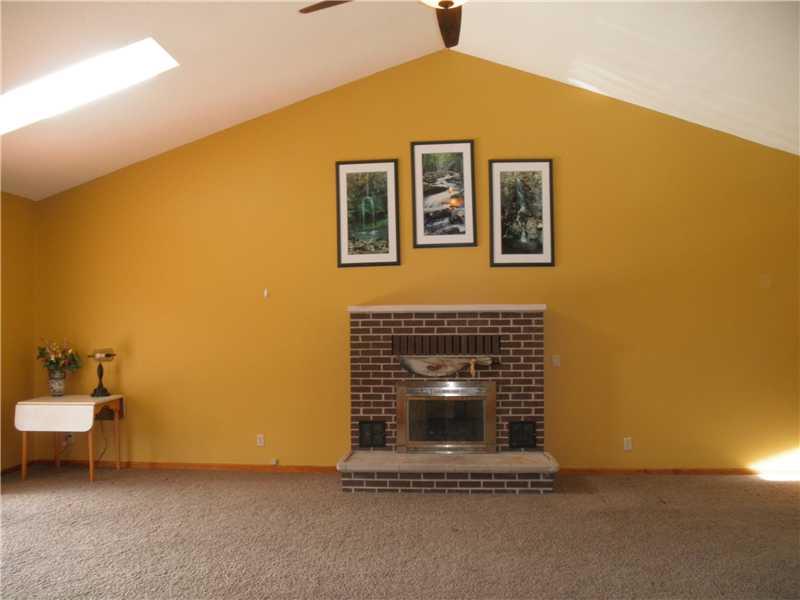 229 McKenzie Road Clinton, PA 15026 - Photo 14 of 25 Family Room. Woodburning fireplace with walk out to deck. Wet bar in family room.