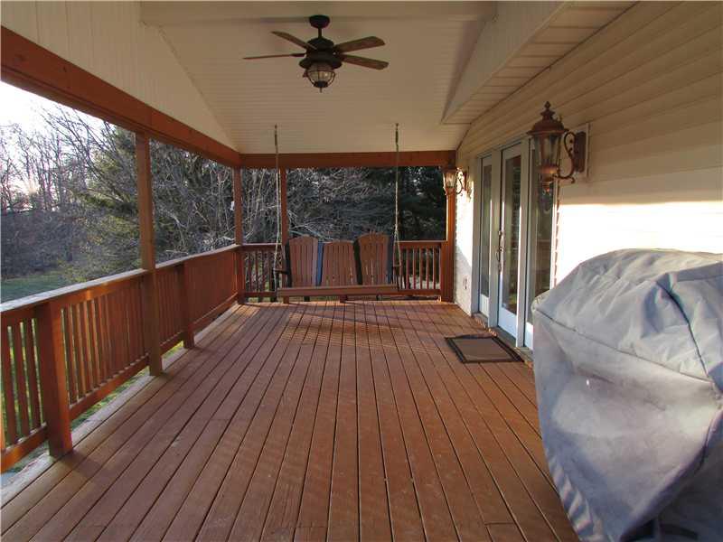 229 McKenzie Road Clinton, PA 15026 - Photo 24 of 25 Patio/Deck. Large rear deck. Walk out from family room. Finished ceiling with fan.