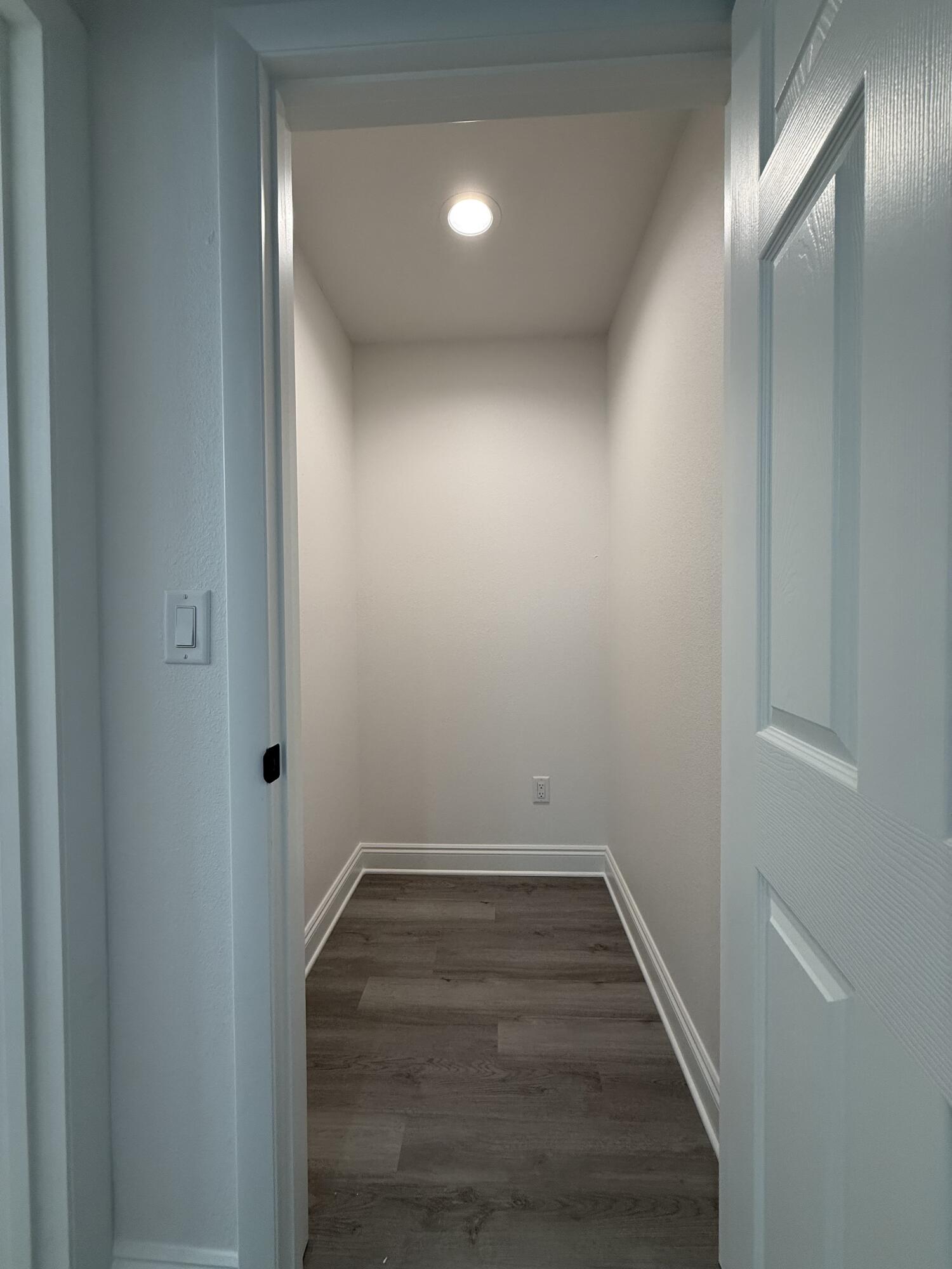 32 Constitution Avenue, Unit AB DeFuniak Springs, FL 32433 - Photo 15 of 22 a view of a hallway