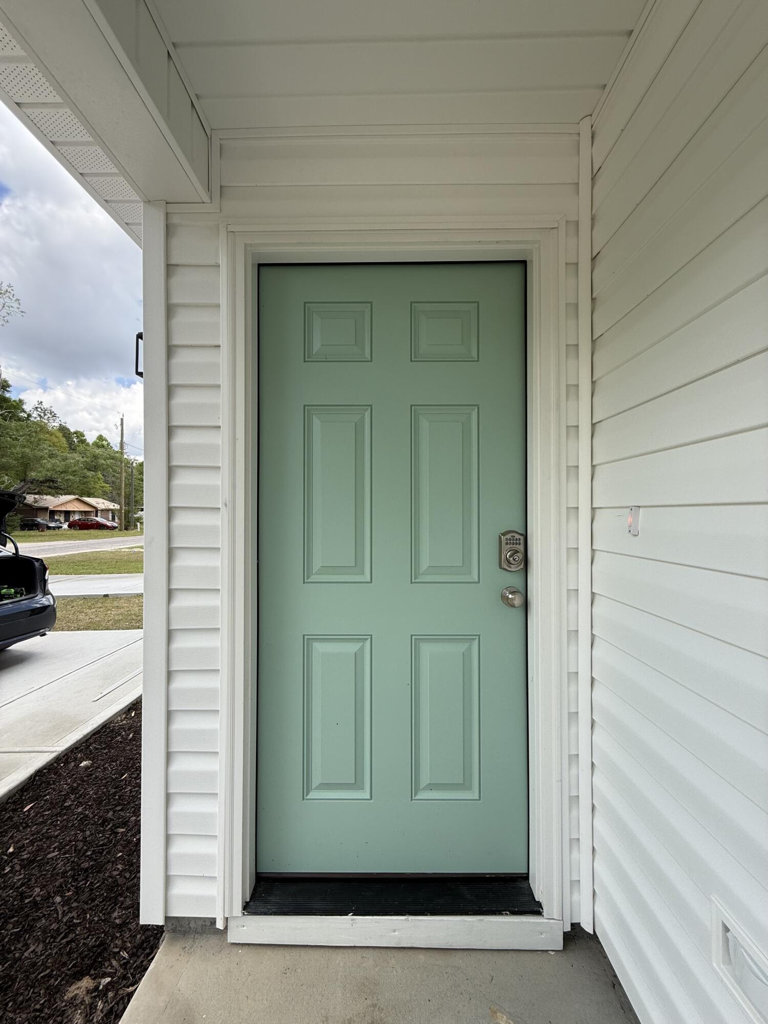 32 Constitution Avenue, Unit AB DeFuniak Springs, FL 32433 - Photo 3 of 22 a view of front door