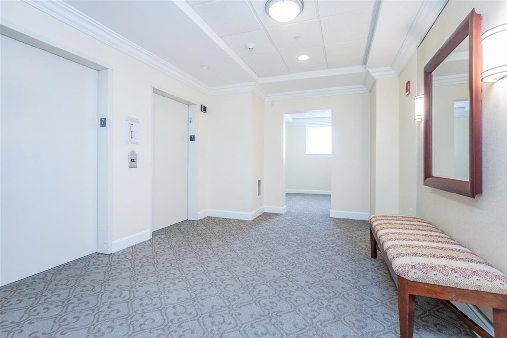 36 Village Road, Unit 706 Middleton, MA 01949 - Photo 6 of 42 a view of room with a lounge chair