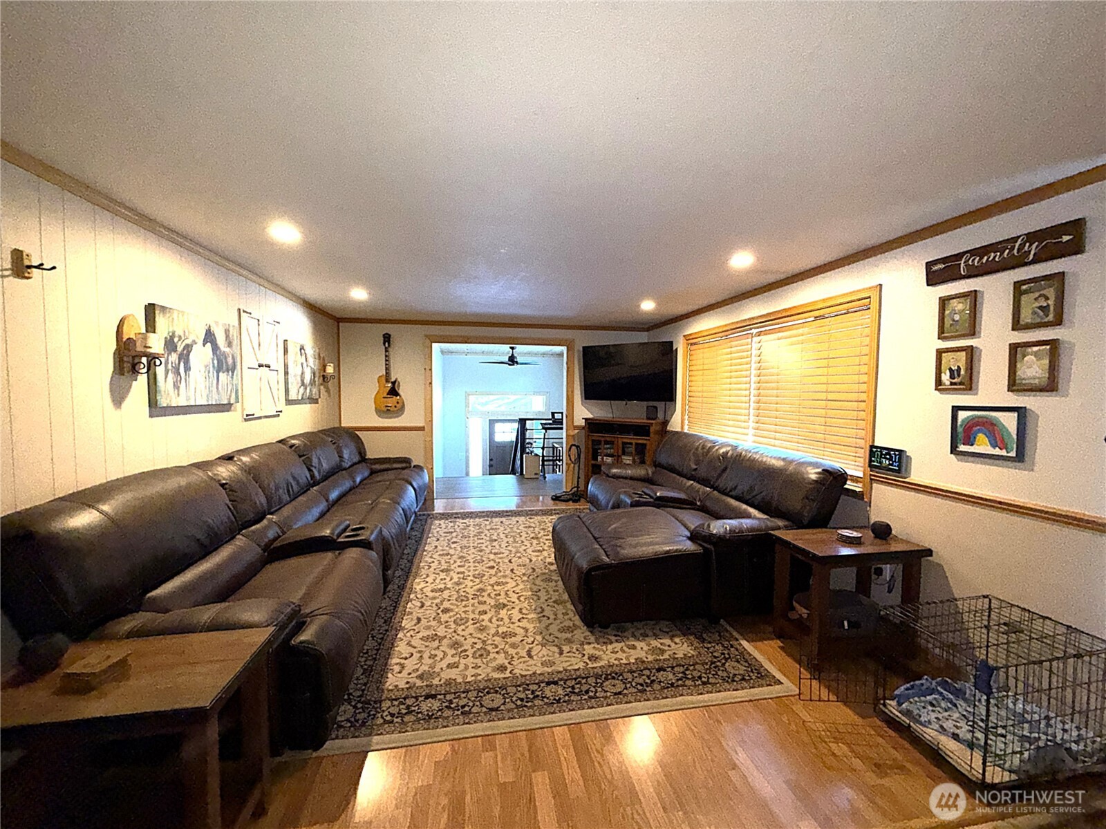 23 Tonata Creek Road Curlew, WA 99118 - Photo 7 of 38 a living room with furniture and a flat screen tv
