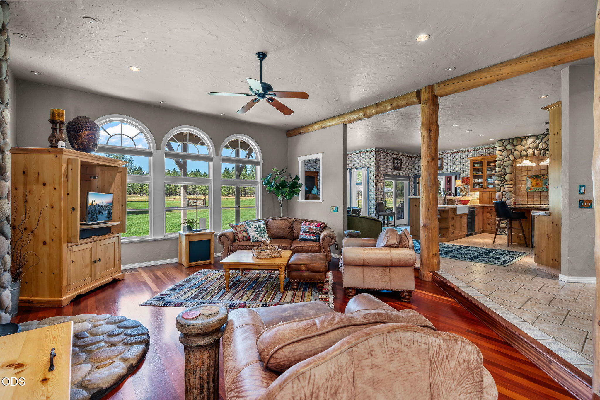 67376 Peterson Mill Road Sisters, OR 97759 - Photo 16 of 72 a living room with furniture and a large window