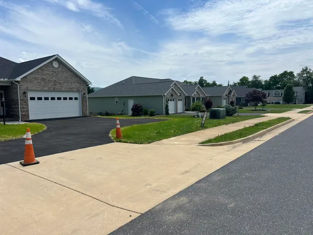 a view of a backyard of the house