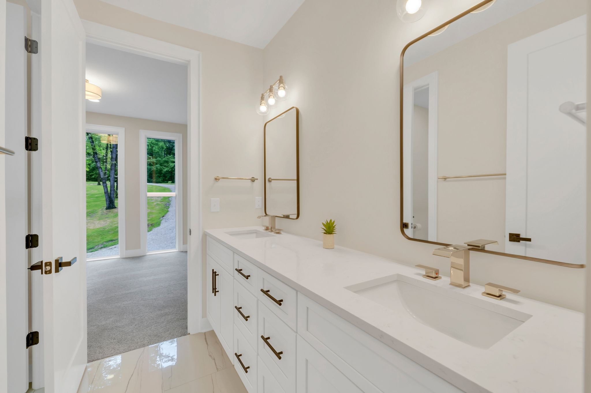 4 Whippoorwill Cove Road Winchester, TN 37398 - Photo 17 of 40 a bathroom with double vanity sinks and a mirror