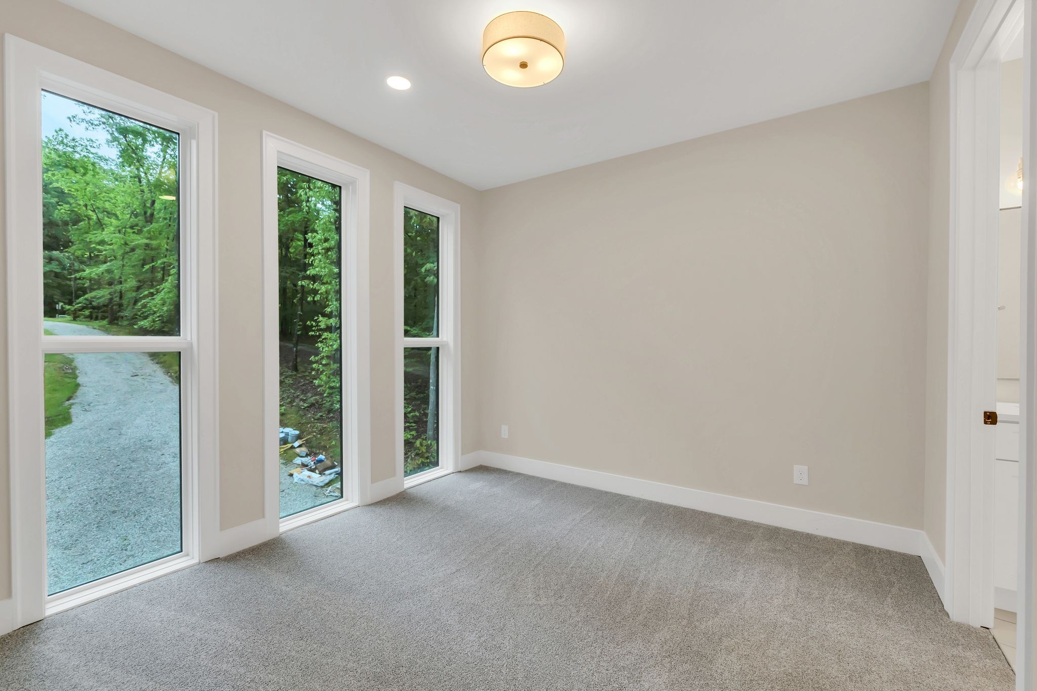 4 Whippoorwill Cove Road Winchester, TN 37398 - Photo 18 of 40 an empty room with windows and outdoor view