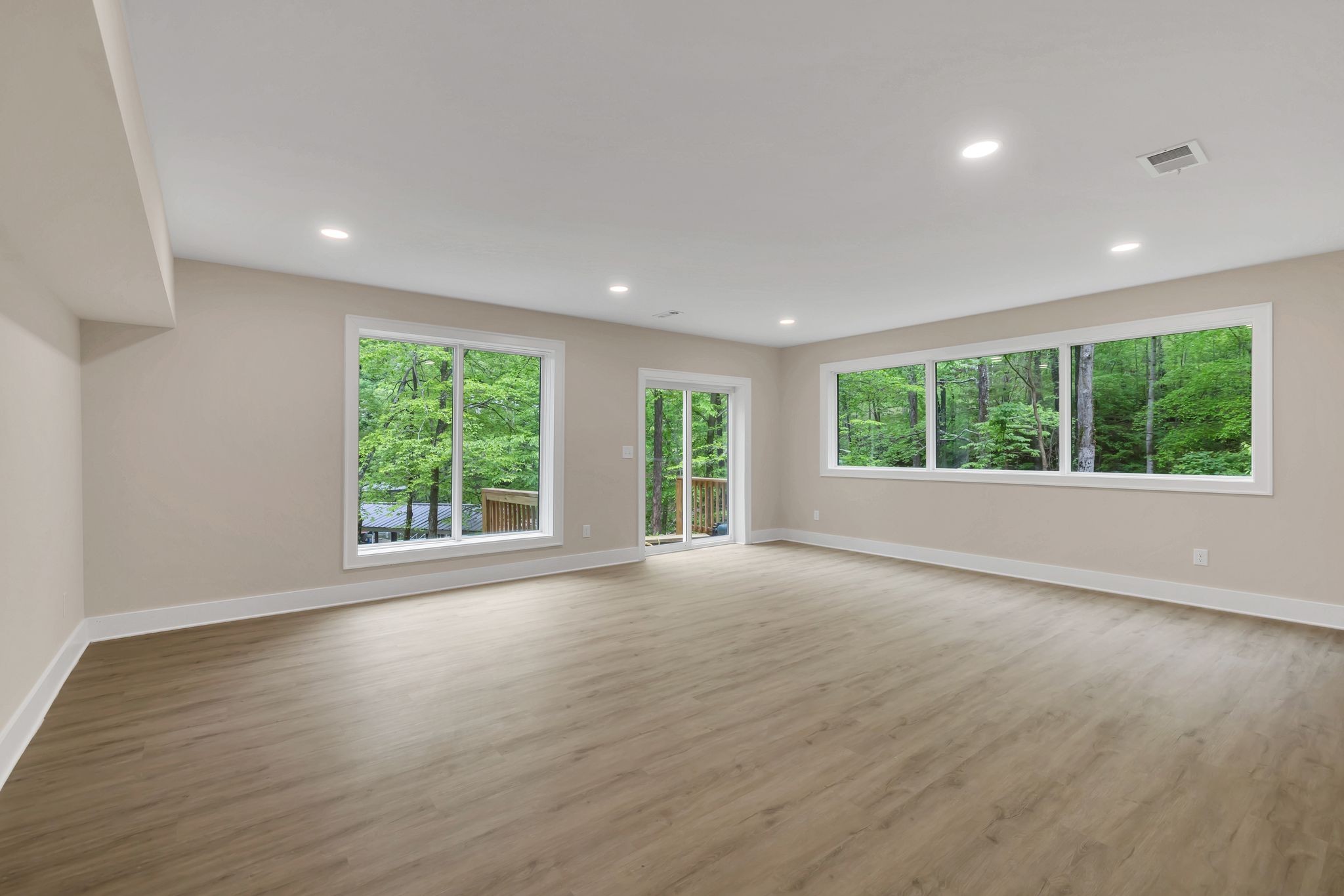 4 Whippoorwill Cove Road Winchester, TN 37398 - Photo 32 of 40 a view of an empty room with wooden floor and windows
