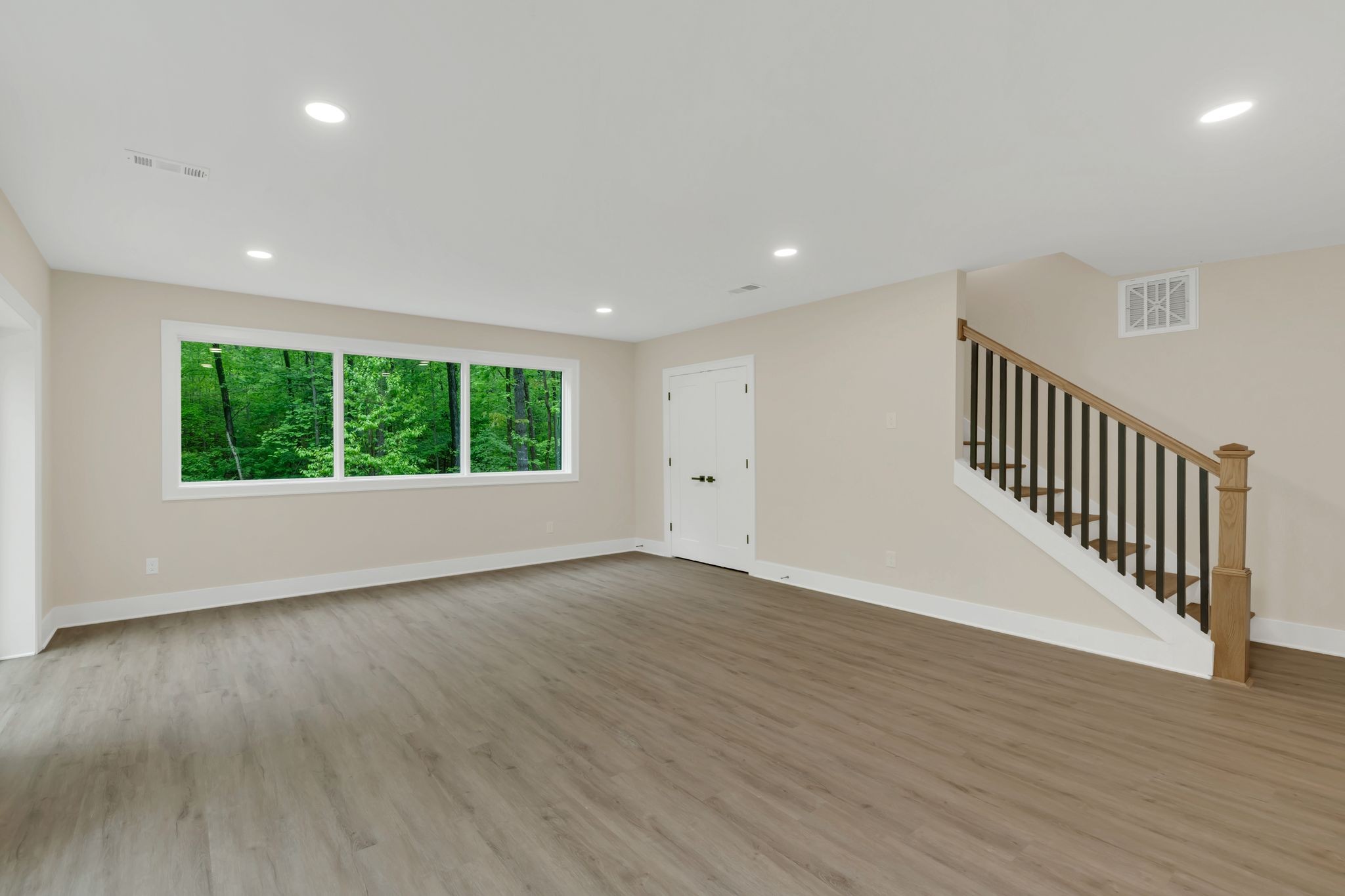 4 Whippoorwill Cove Road Winchester, TN 37398 - Photo 33 of 40 an empty room with wooden floor and windows