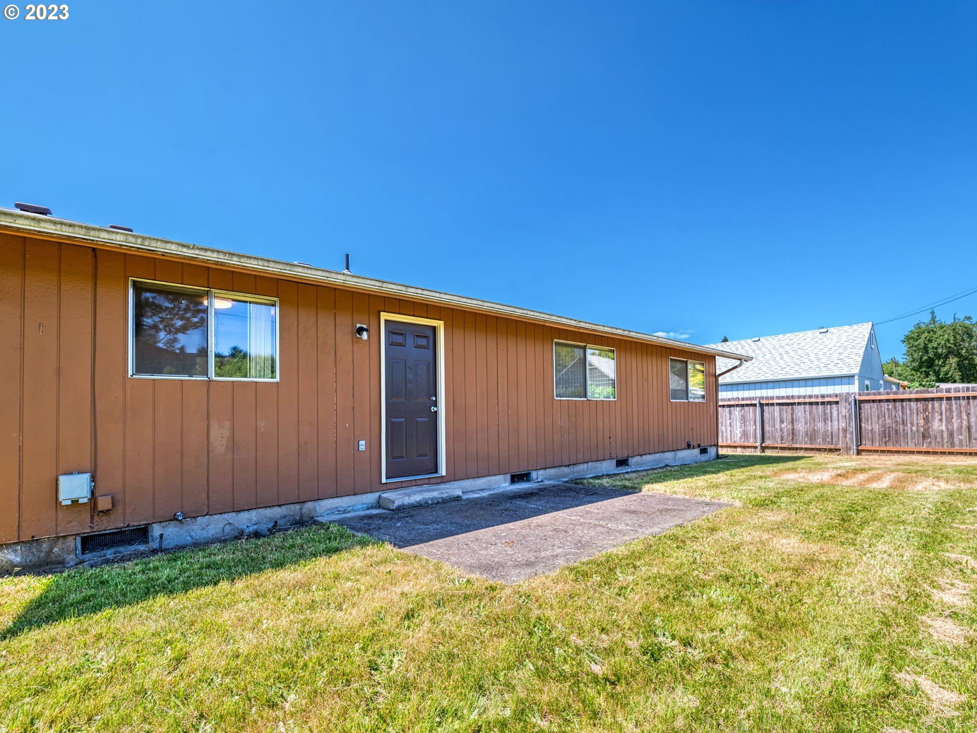1249 6th Street Springfield, OR 97477 - Photo 19 of 24 a front view of a house with a yard