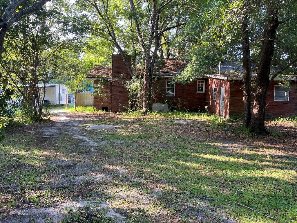 2017 Clinch Drive Fernandina Beach, FL 32034 - Photo 11 of 22 a view of a house with a yard