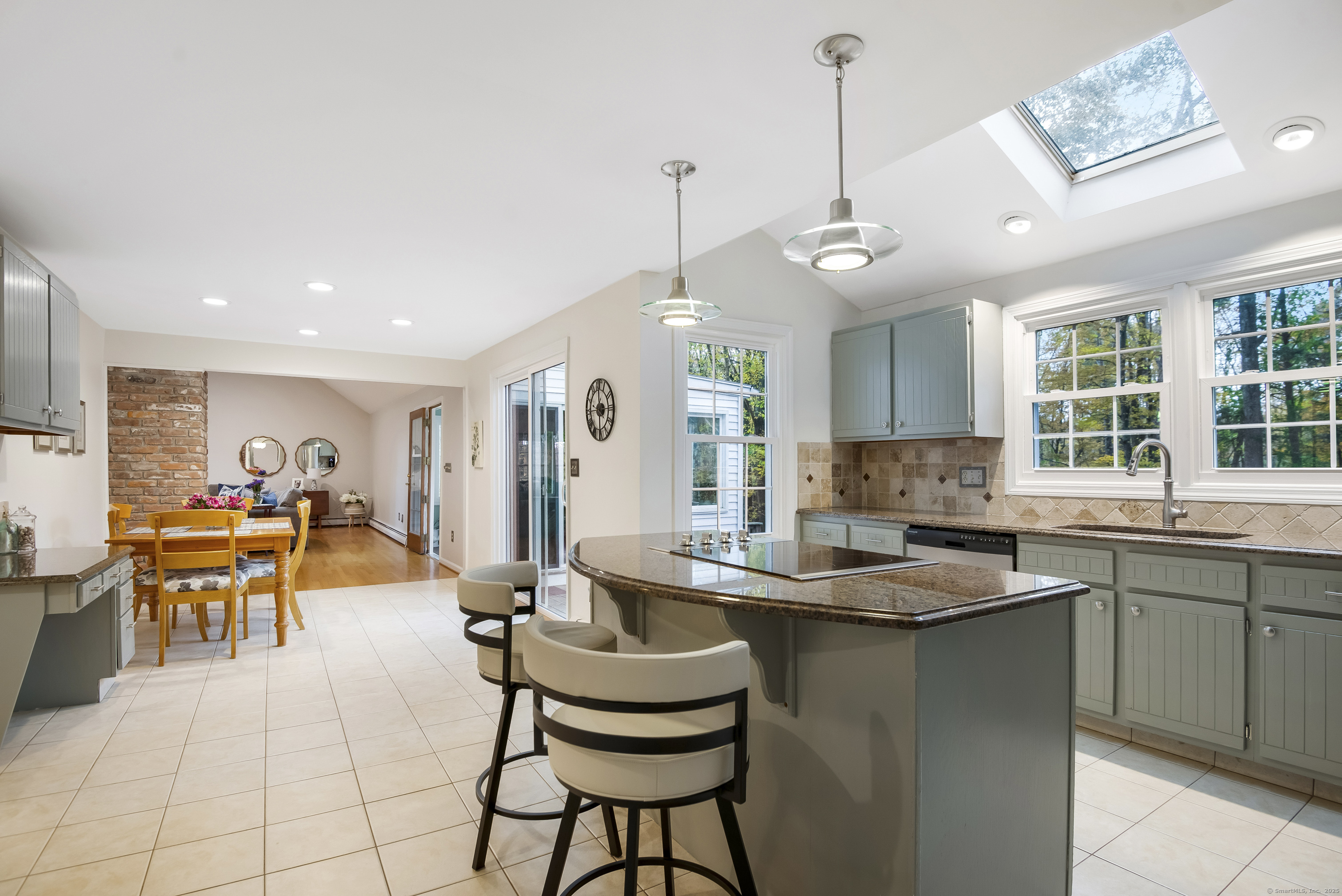 48 Bar Gate Trail Killingworth, CT 06419 - Photo 18 of 40 a kitchen with living room and chairs