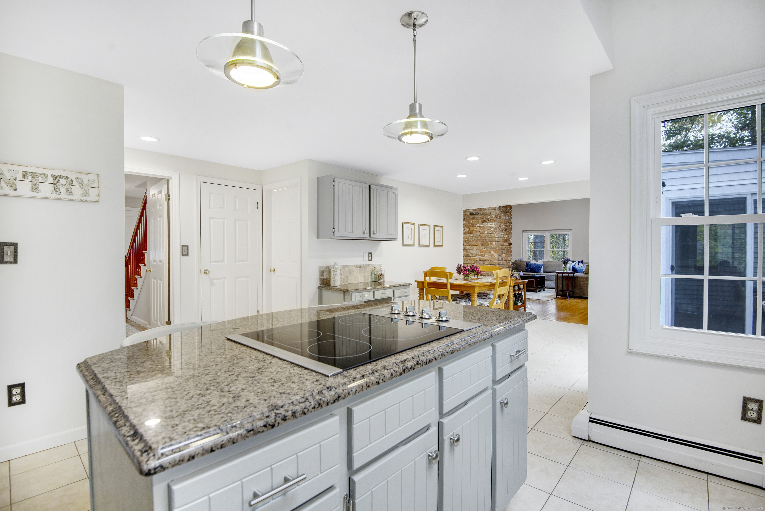 48 Bar Gate Trail Killingworth, CT 06419 - Photo 19 of 40 a kitchen with stainless steel appliances granite countertop a sink dishwasher and cabinets