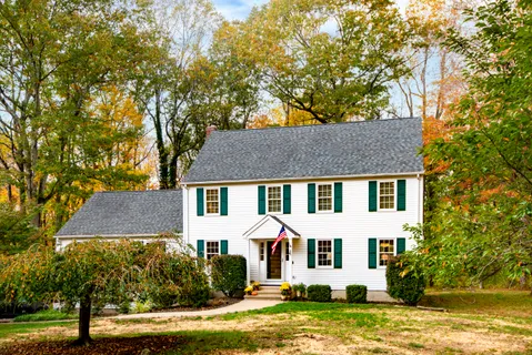 front view of a house with a yard