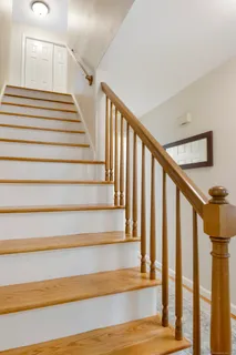 a bedroom with a bed and furniture