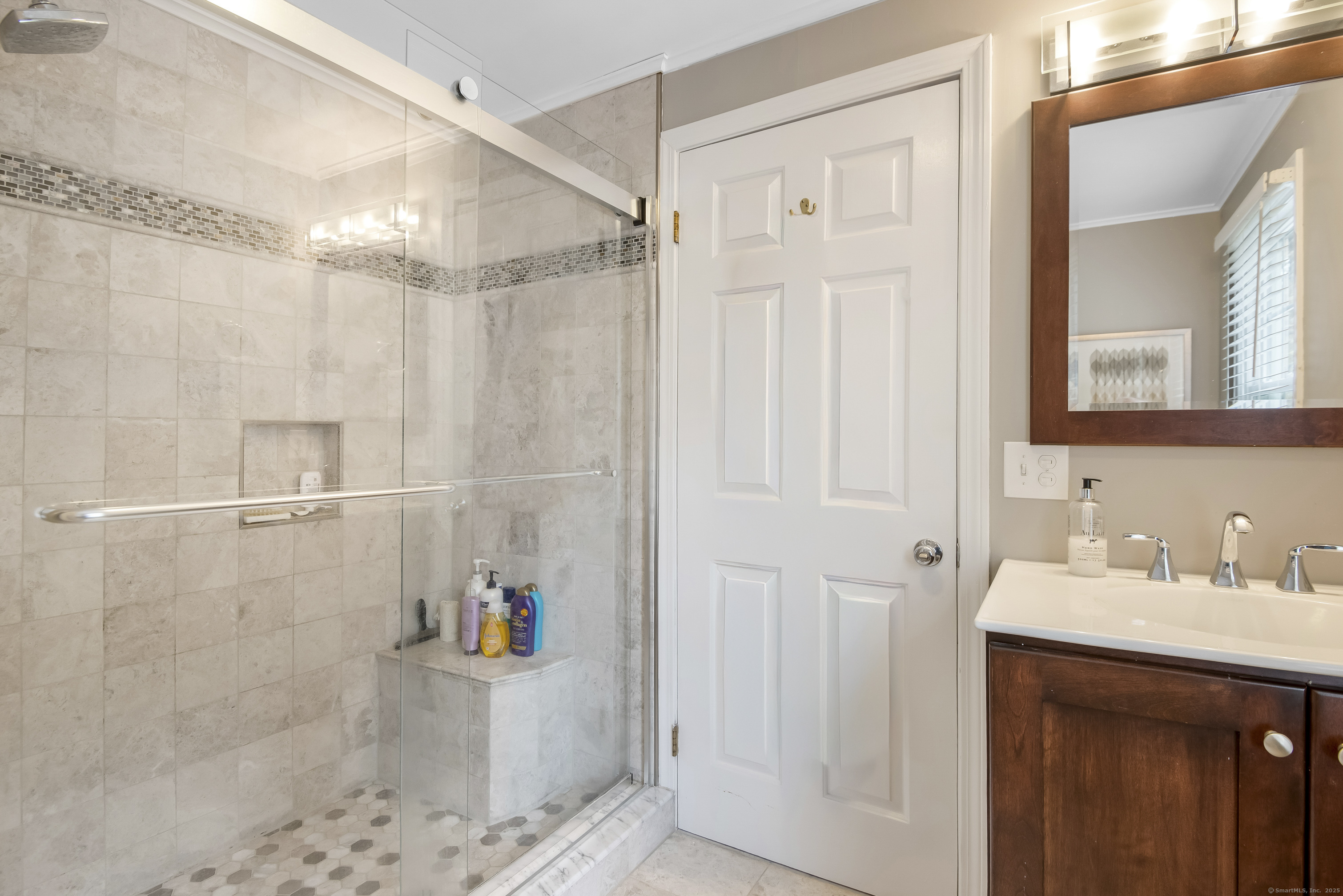 48 Bar Gate Trail Killingworth, CT 06419 - Photo 28 of 40 a bathroom with a sink a shower and a mirror