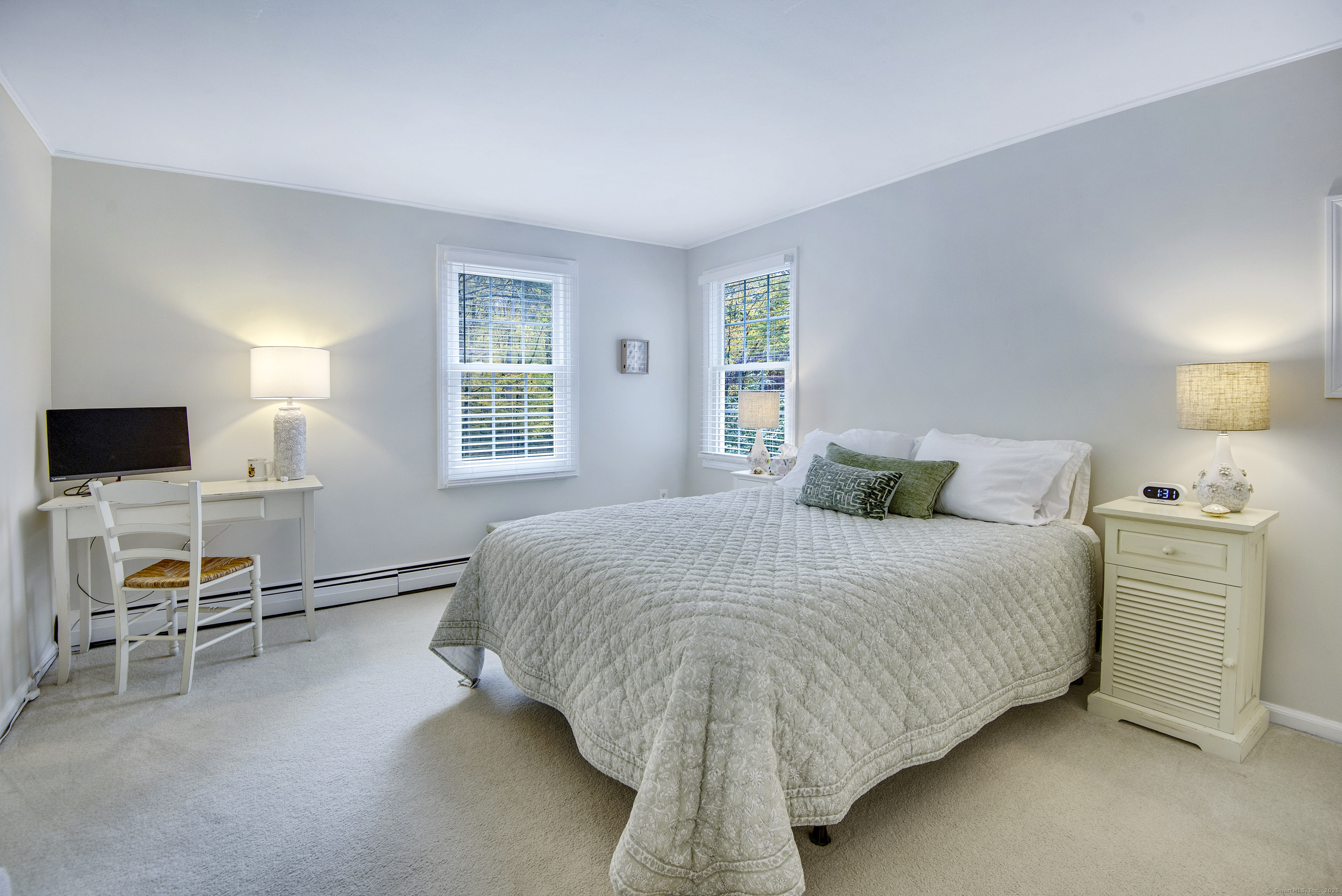 48 Bar Gate Trail Killingworth, CT 06419 - Photo 30 of 40 a bedroom with a bed and chair