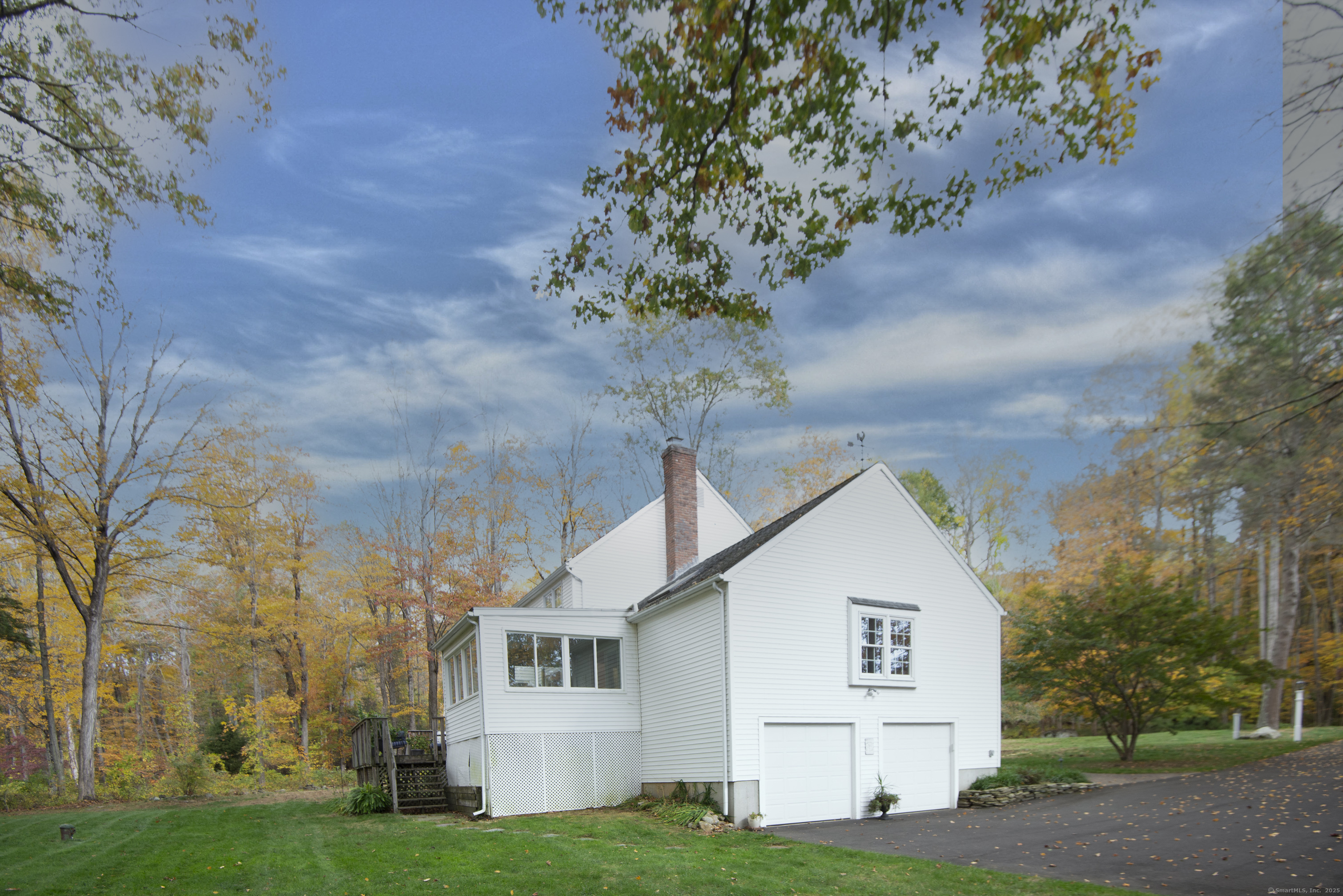48 Bar Gate Trail Killingworth, CT 06419 - Photo 38 of 40 a view of a house with a yard