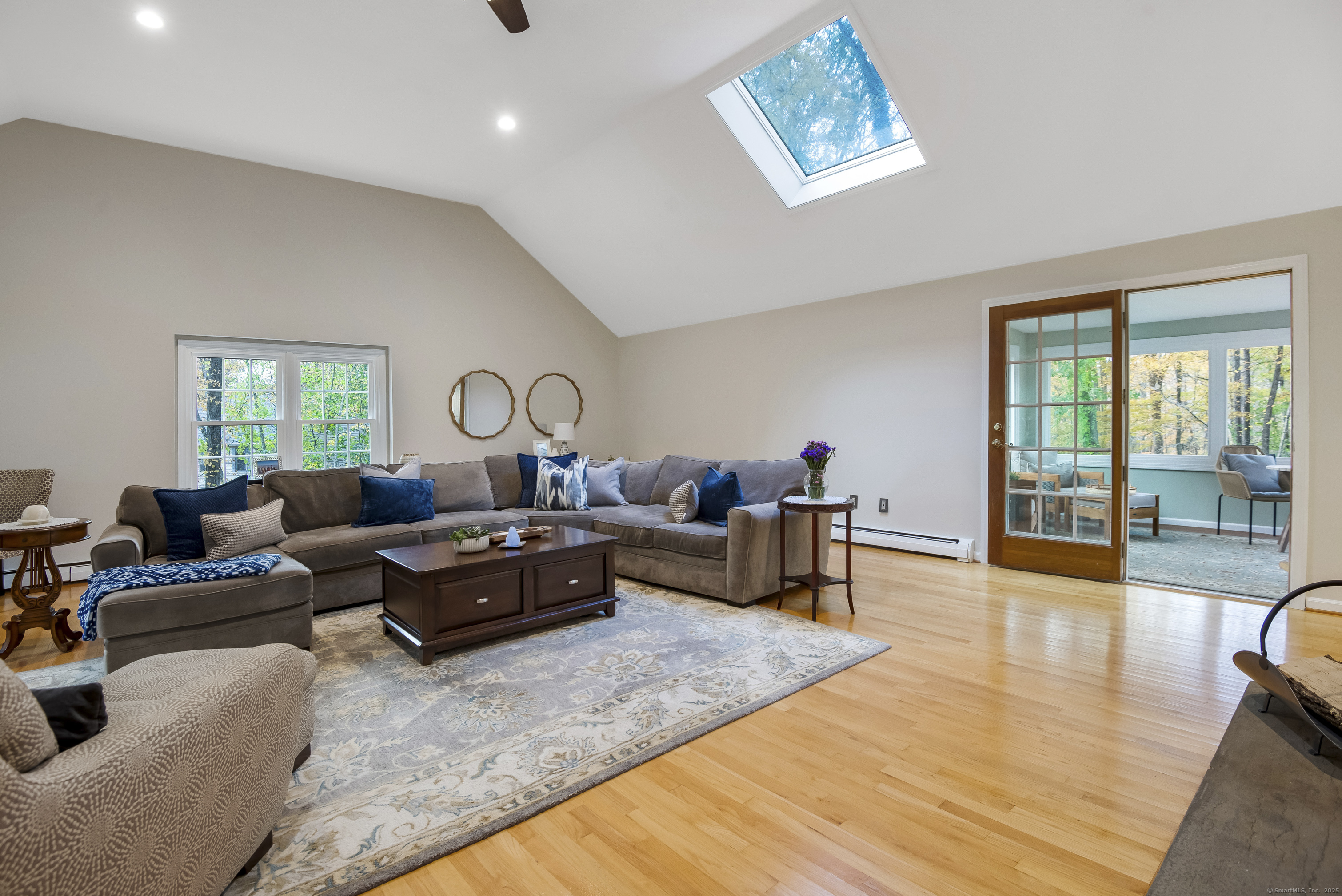 48 Bar Gate Trail Killingworth, CT 06419 - Photo 7 of 40 a living room with furniture and a wooden floor
