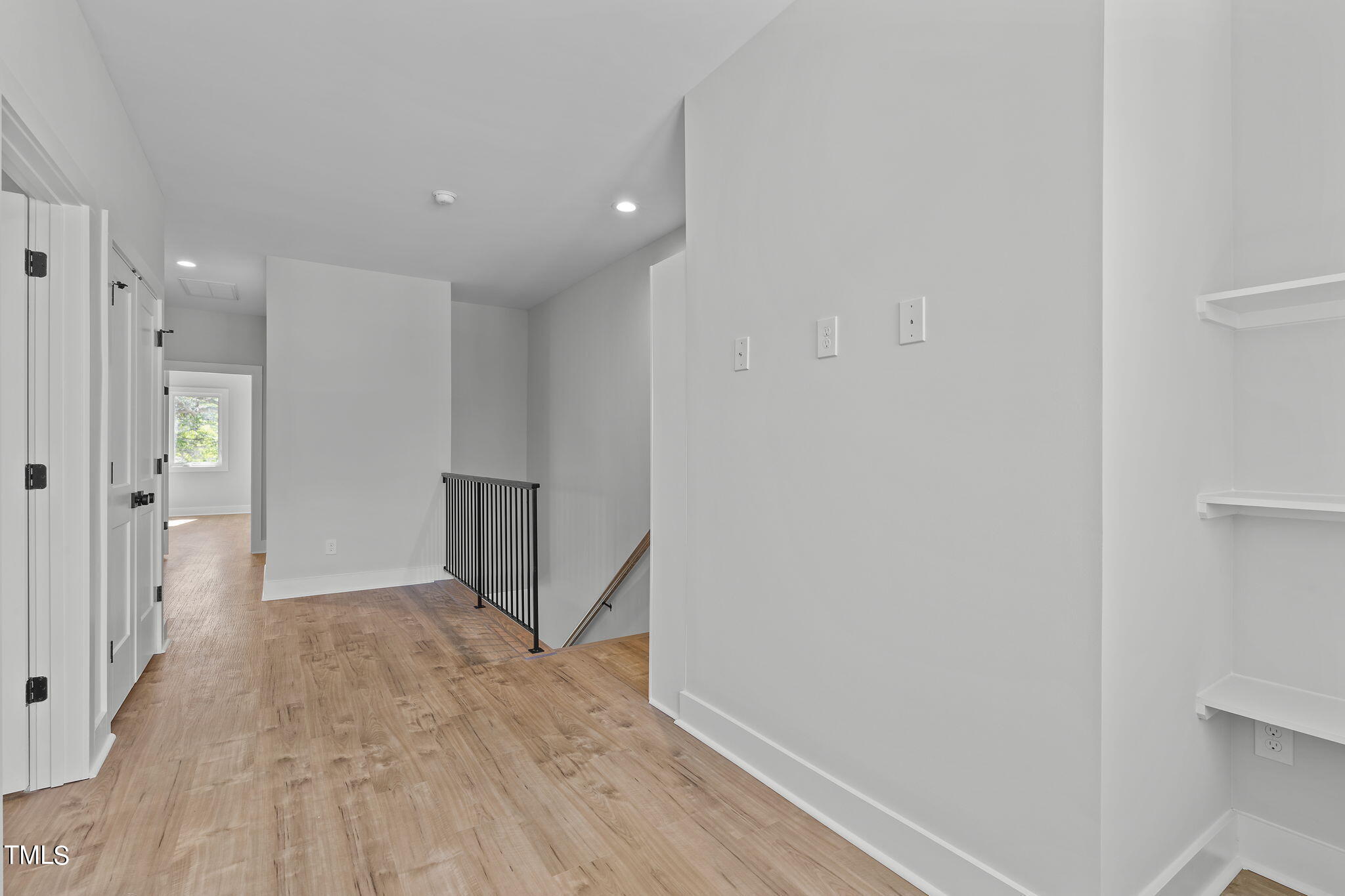 2232 Sheffield Road, Unit 102 Raleigh, NC 27610 - Photo 17 of 32 a view of entryway with wooden floor