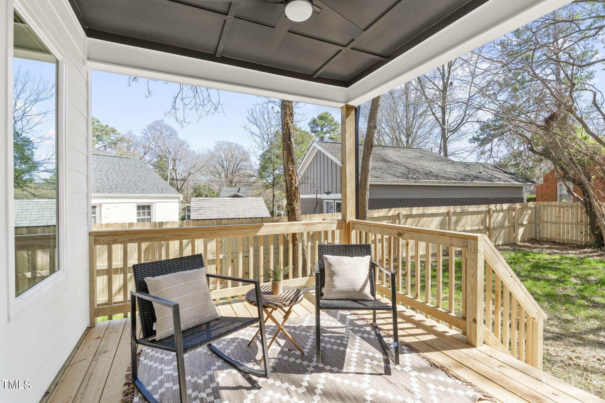 2232 Sheffield Road, Unit 102 Raleigh, NC 27610 - Photo 26 of 32 a view of a chair and table in the balcony