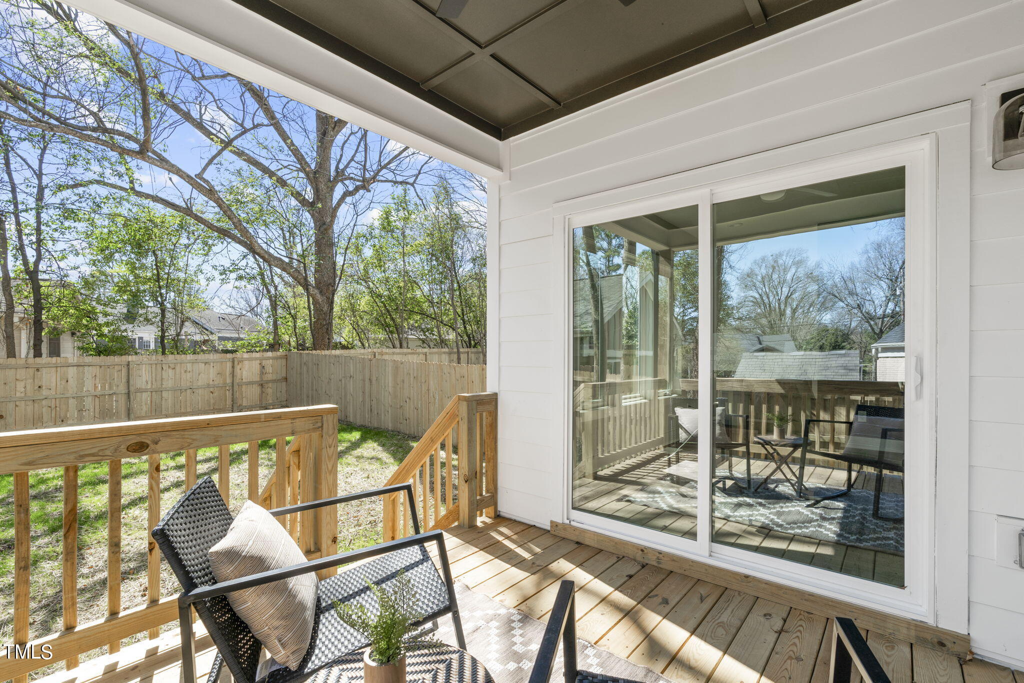 2232 Sheffield Road, Unit 102 Raleigh, NC 27610 - Photo 27 of 32 a view of a chair and table in the balcony