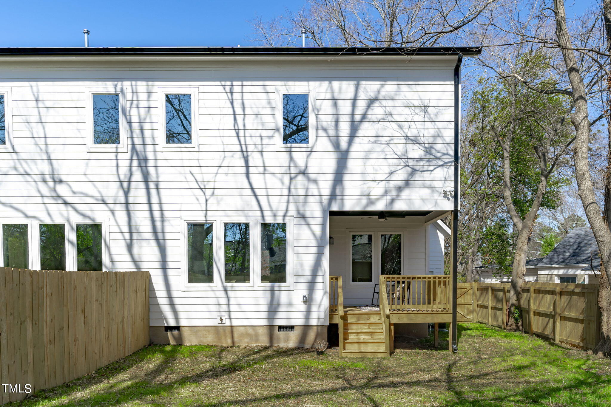 2232 Sheffield Road, Unit 102 Raleigh, NC 27610 - Photo 29 of 32 a view of house with backyard