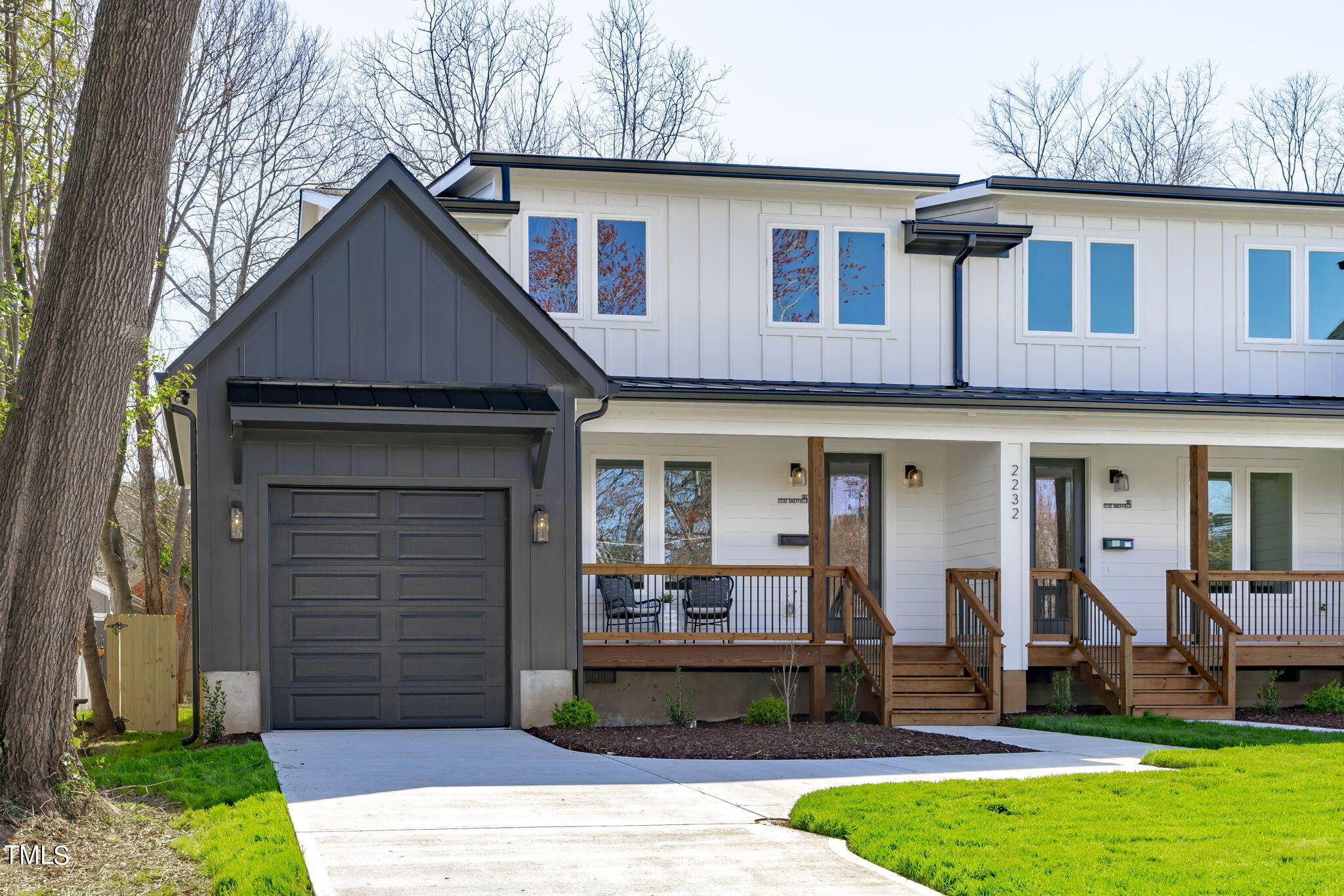 2232 Sheffield Road, Unit 102 Raleigh, NC 27610 - Photo 30 of 32 a front view of a house with garden