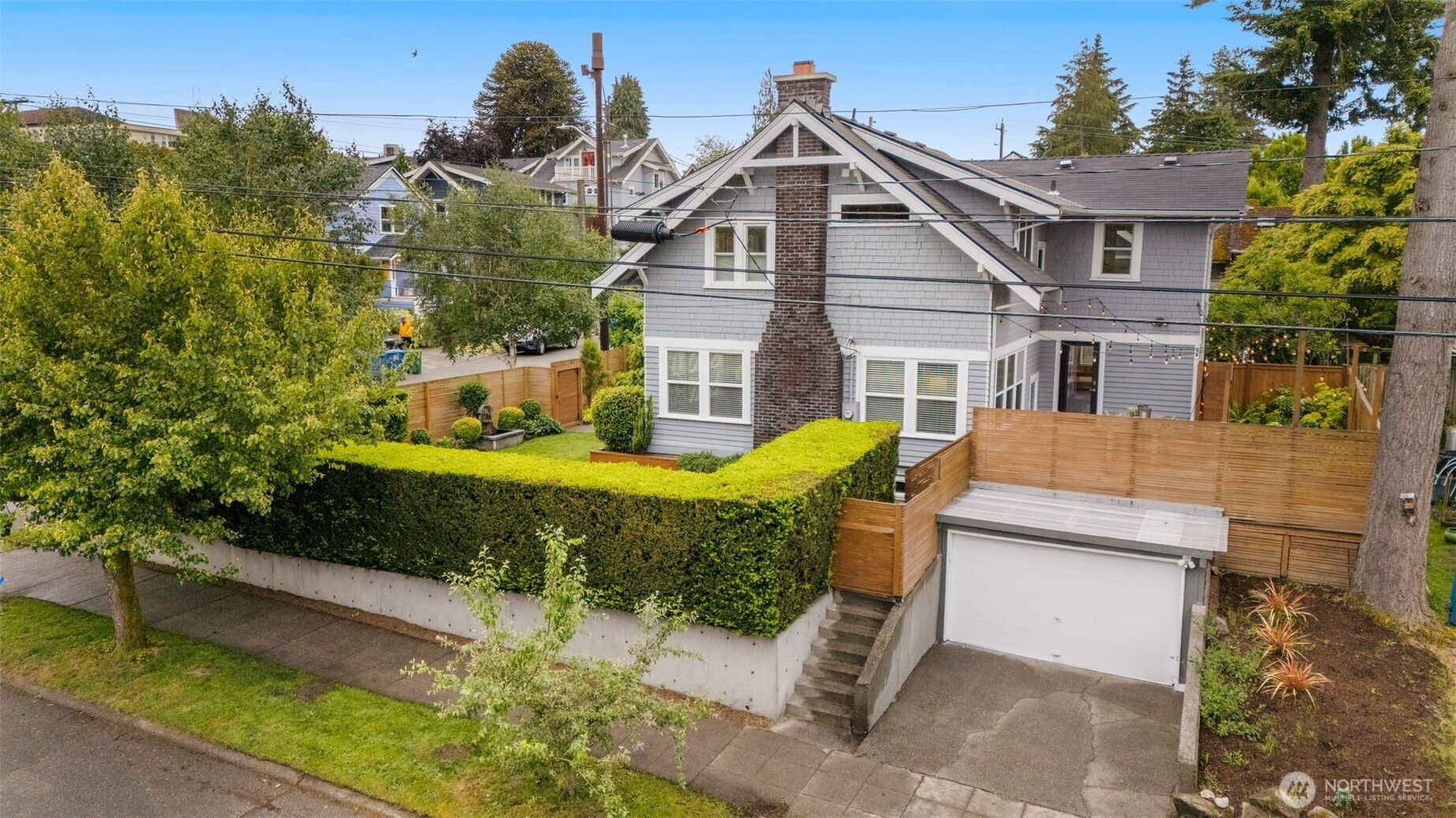 170 Lynn Street Seattle, WA 98109 - Photo 36 of 40 a view of a house with a yard