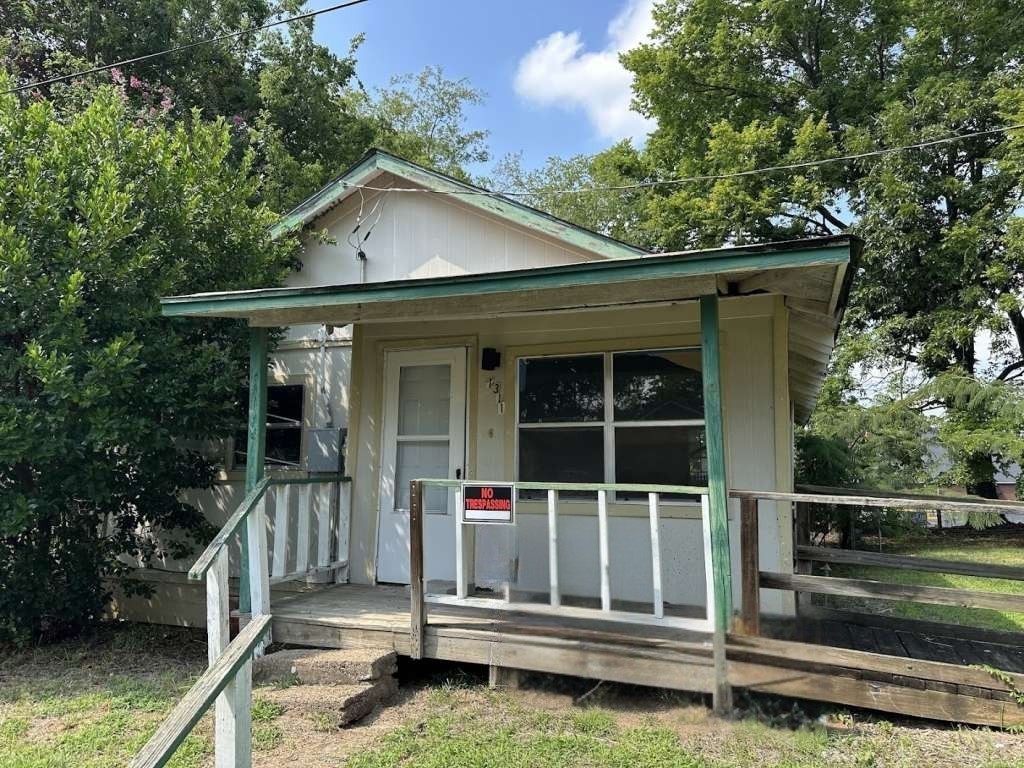 1311 West Grove Street Tyler, TX 75701 - Photo 2 of 14 a view of house with a small yard