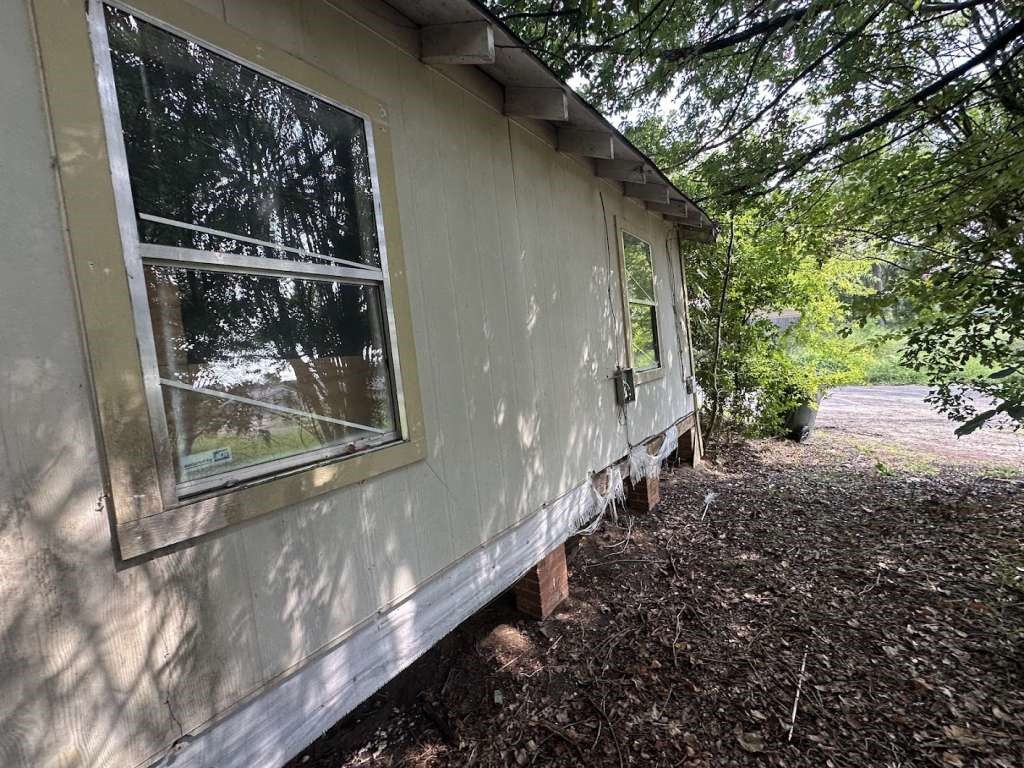 1311 West Grove Street Tyler, TX 75701 - Photo 3 of 12 a view of a pathway of a house with a tree
