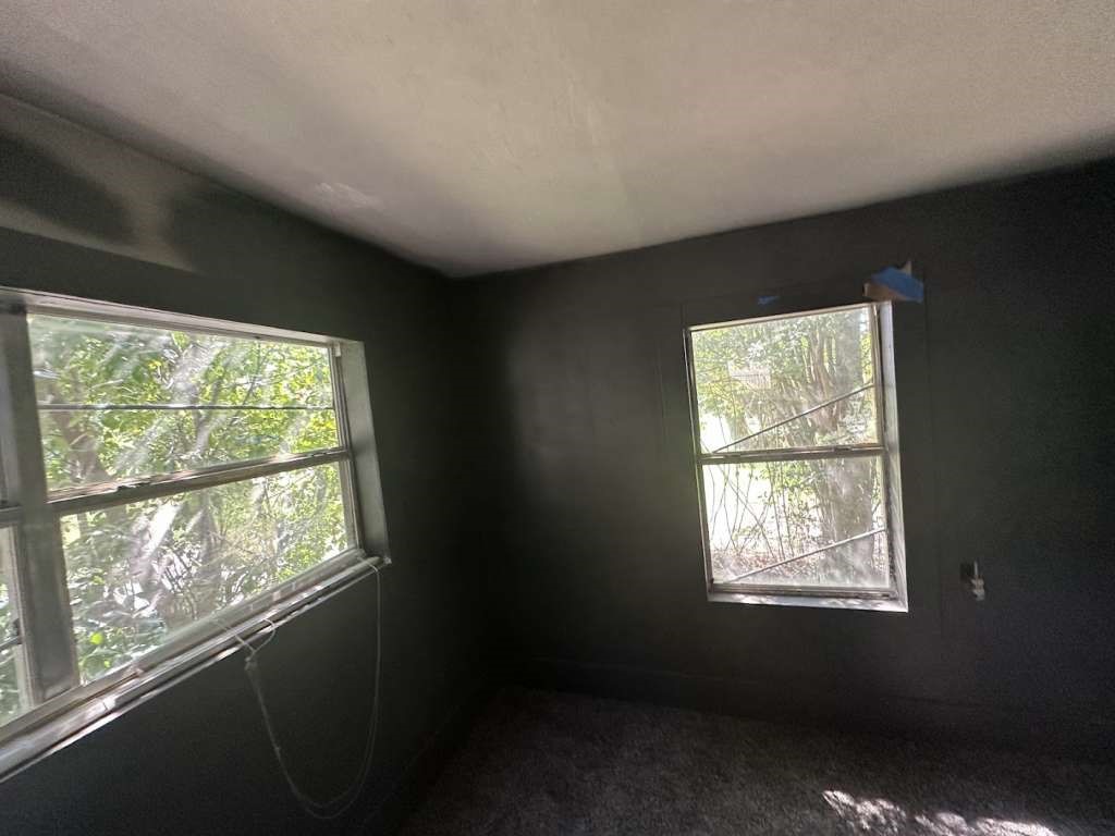 1311 West Grove Street Tyler, TX 75701 - Photo 6 of 12 a view of an empty room with a window